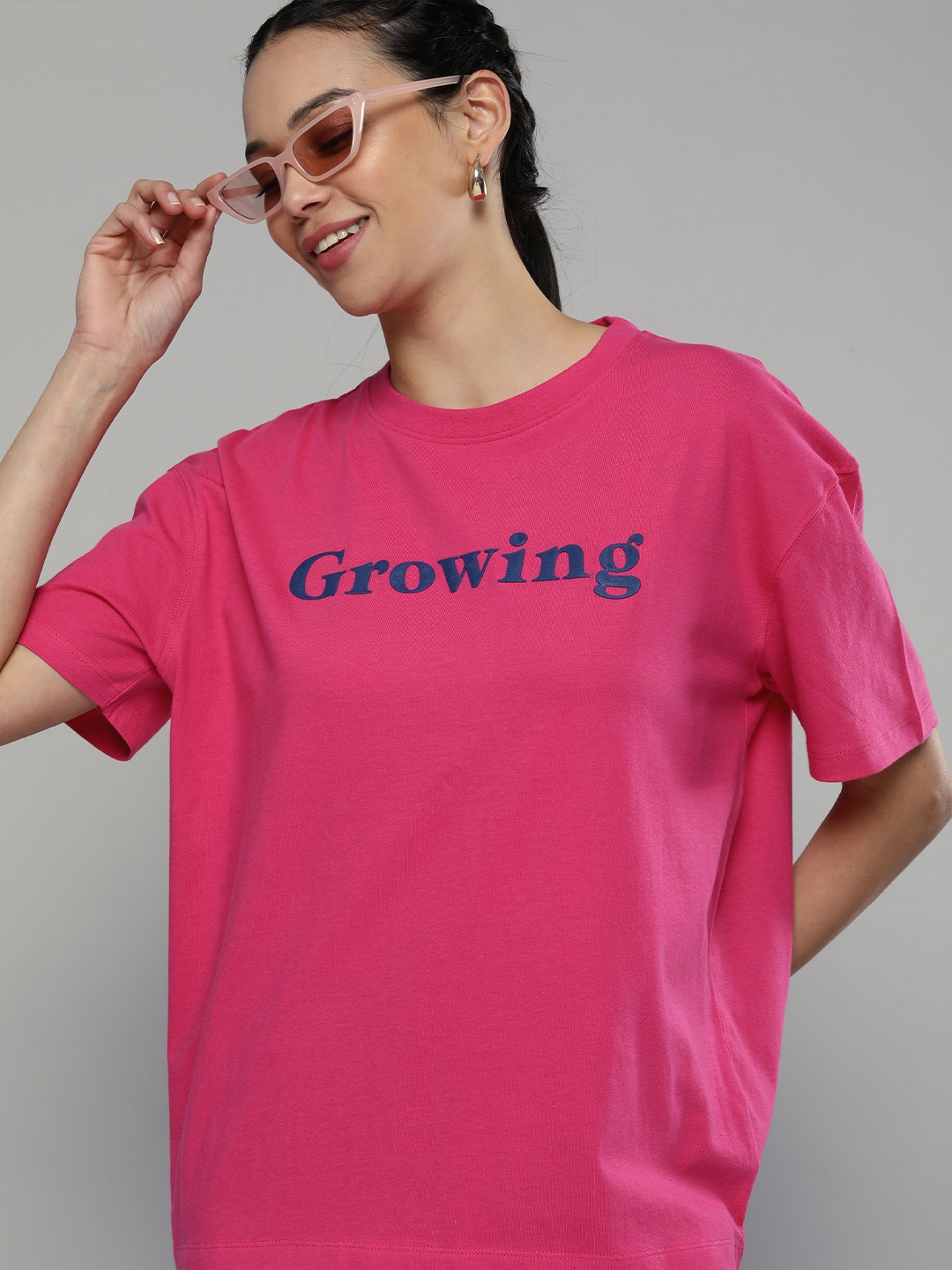 

HERE&NOW Women Fuchsia Pink Typography Drop-Shoulder Sleeves Loose Fit Cotton T-shirt