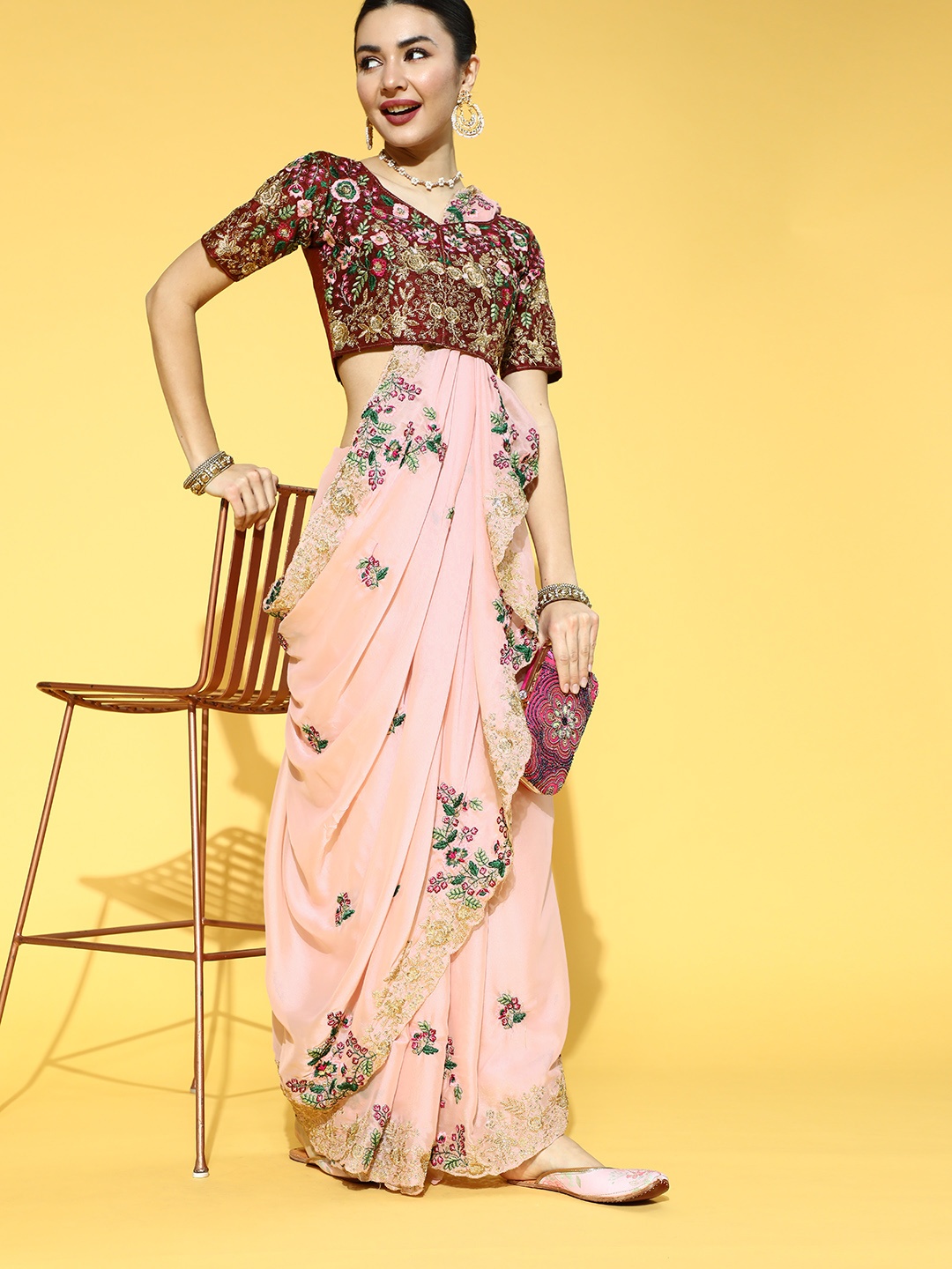 

Mitera Ethnic Motifs Saree with Embroidered Border, Peach