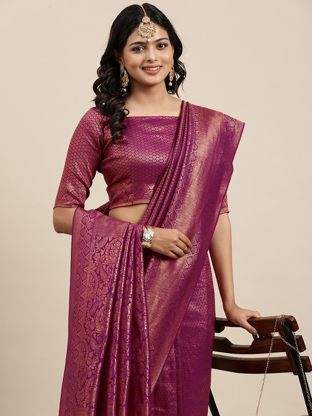

Mitera Purple & Golden Ethnic Motifs Saree with Zari Work