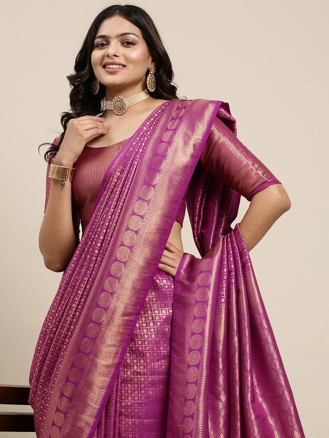 

Mitera Purple & Golden Ethnic Motifs Saree with Zari Work