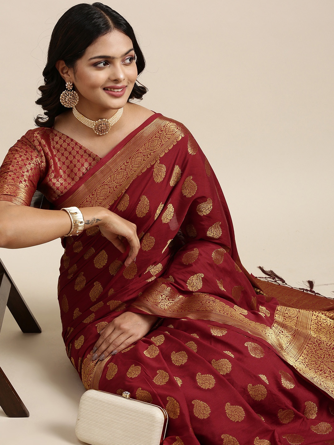 

Mitera Maroon & Golden Ethnic Motifs Saree with Zari Work