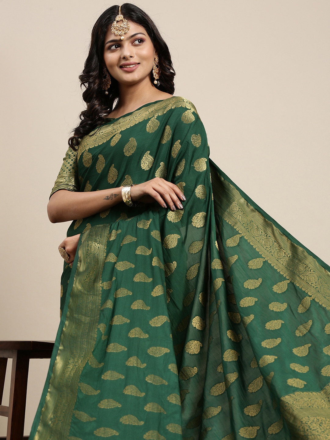 

Mitera Green & Golden Ethnic Motifs Saree with Zari Work