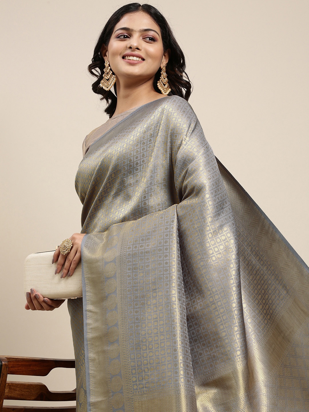 

Mitera Grey & Golden Ethnic Motifs Saree with Zari Work