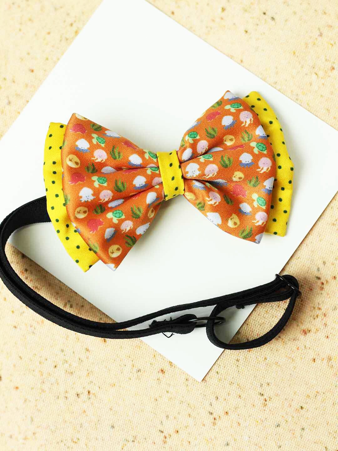 

Tossido Girls Orange & Yellow Printed Layered Bow With Adjustable Elastic Hairband