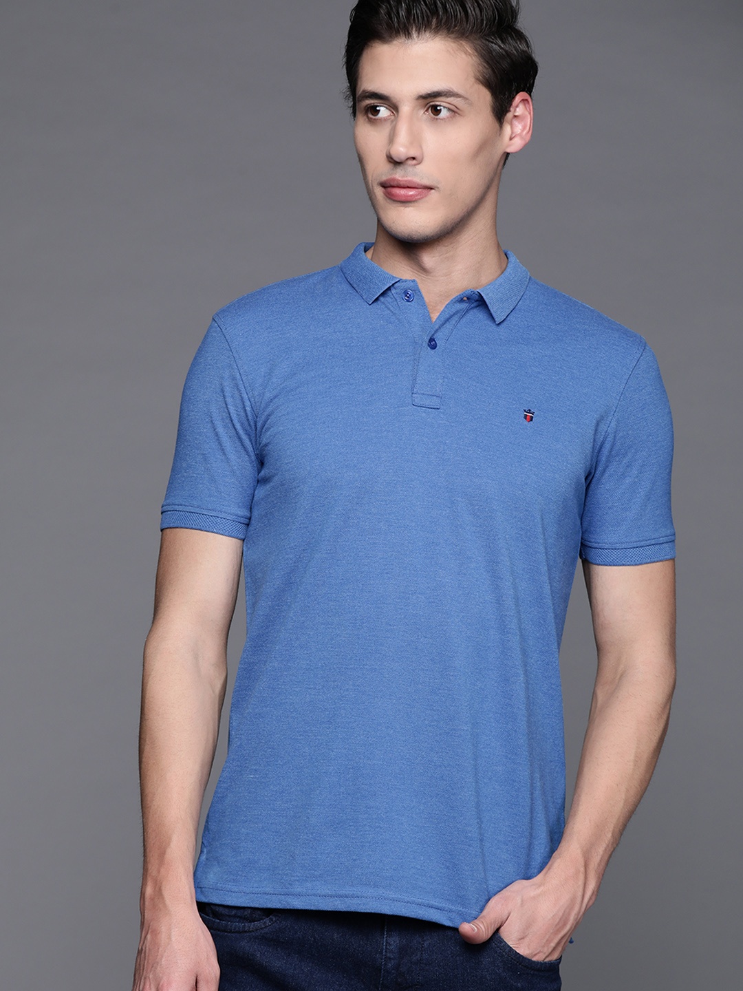 

Louis Philippe Sport Men Blue Solid Polo Collar T-shirt with Melange Effect