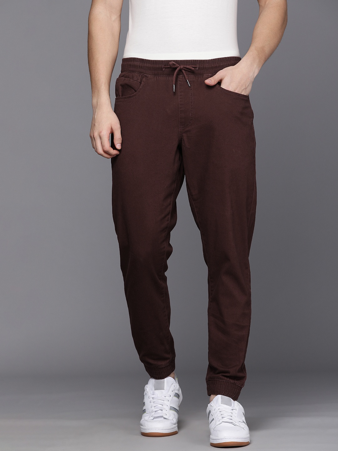 

Louis Philippe Jeans Men Brown Joggers Fit Low-Rise Trousers