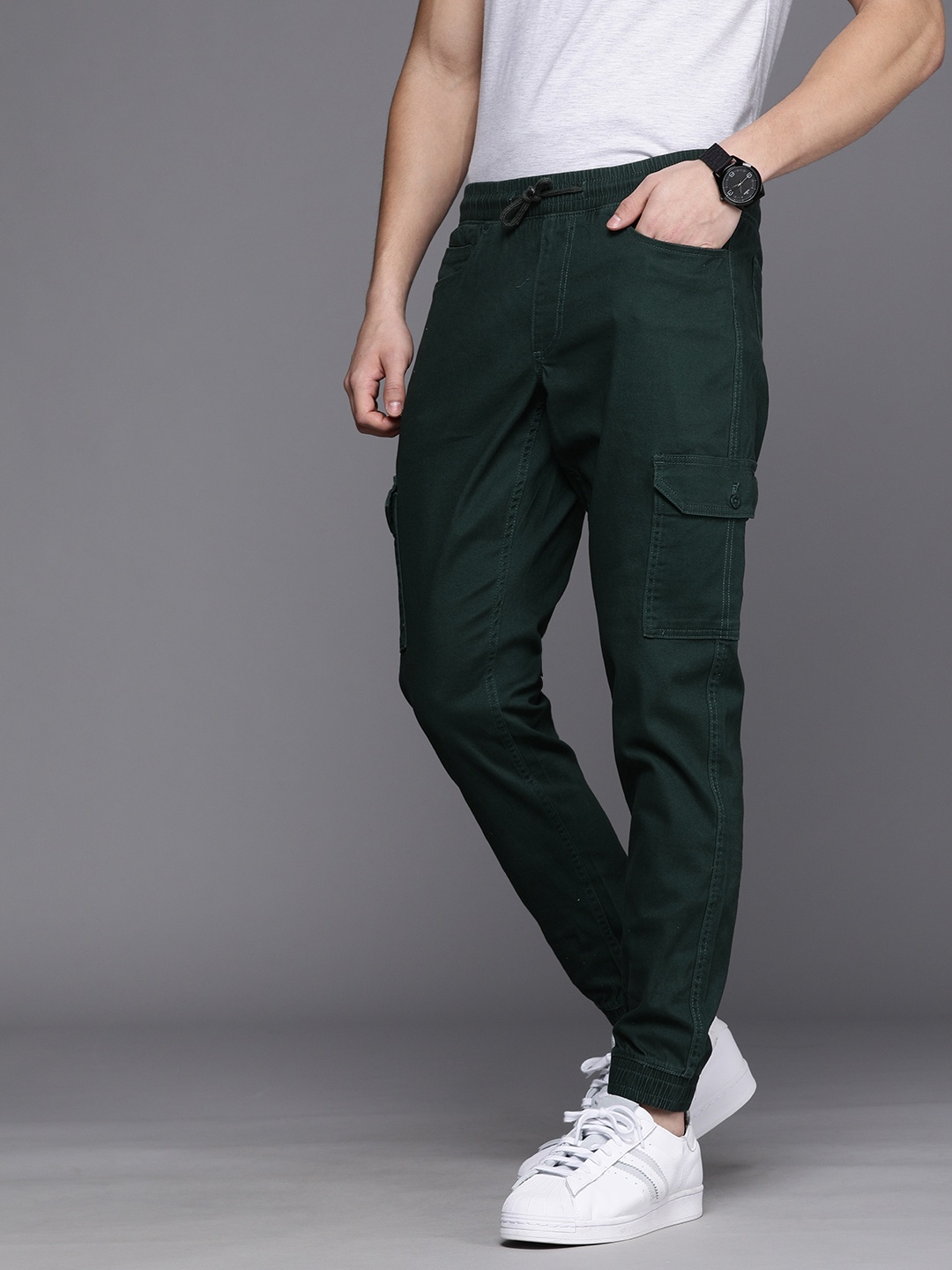 

Louis Philippe Jeans Men Green Solid Loose Fit Cargos