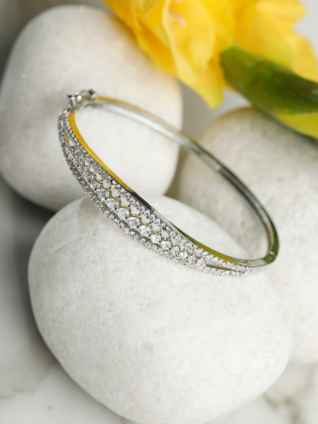 

Priyaasi Women Silver-Toned & White Brass American Diamond Silver-Plated Bangle-Style Bracelet
