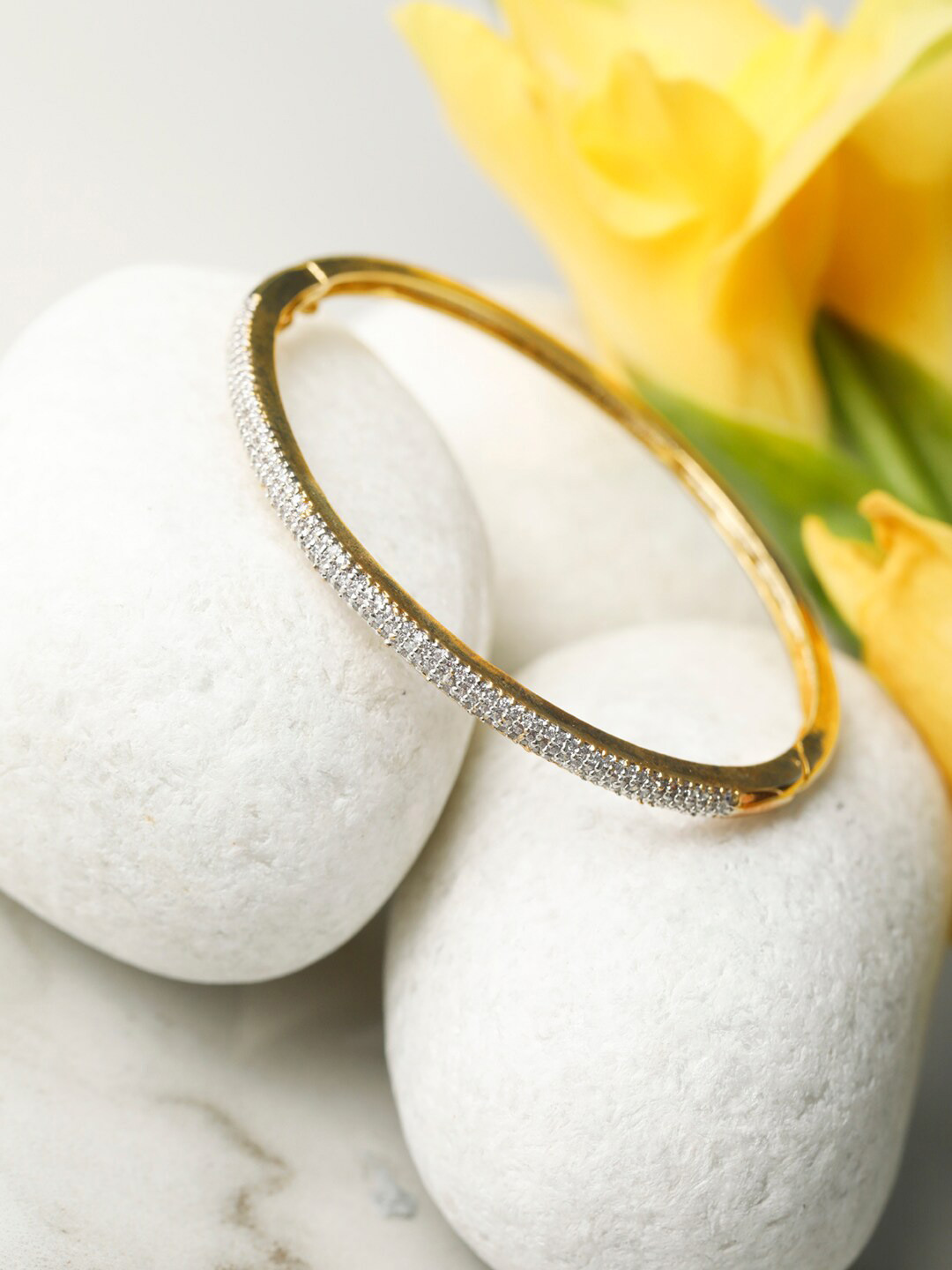 

Priyaasi Women Gold-Toned & White Brass American Diamond Gold-Plated Bangle-Style Bracelet