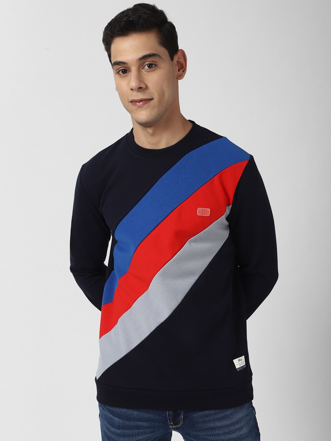 

Peter England Casuals Men Navy Blue & Red Striped Sweatshirt