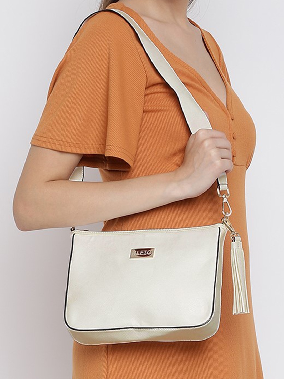 

KLEIO Women Textured Structured Tasselled Shoulder Bag, Beige
