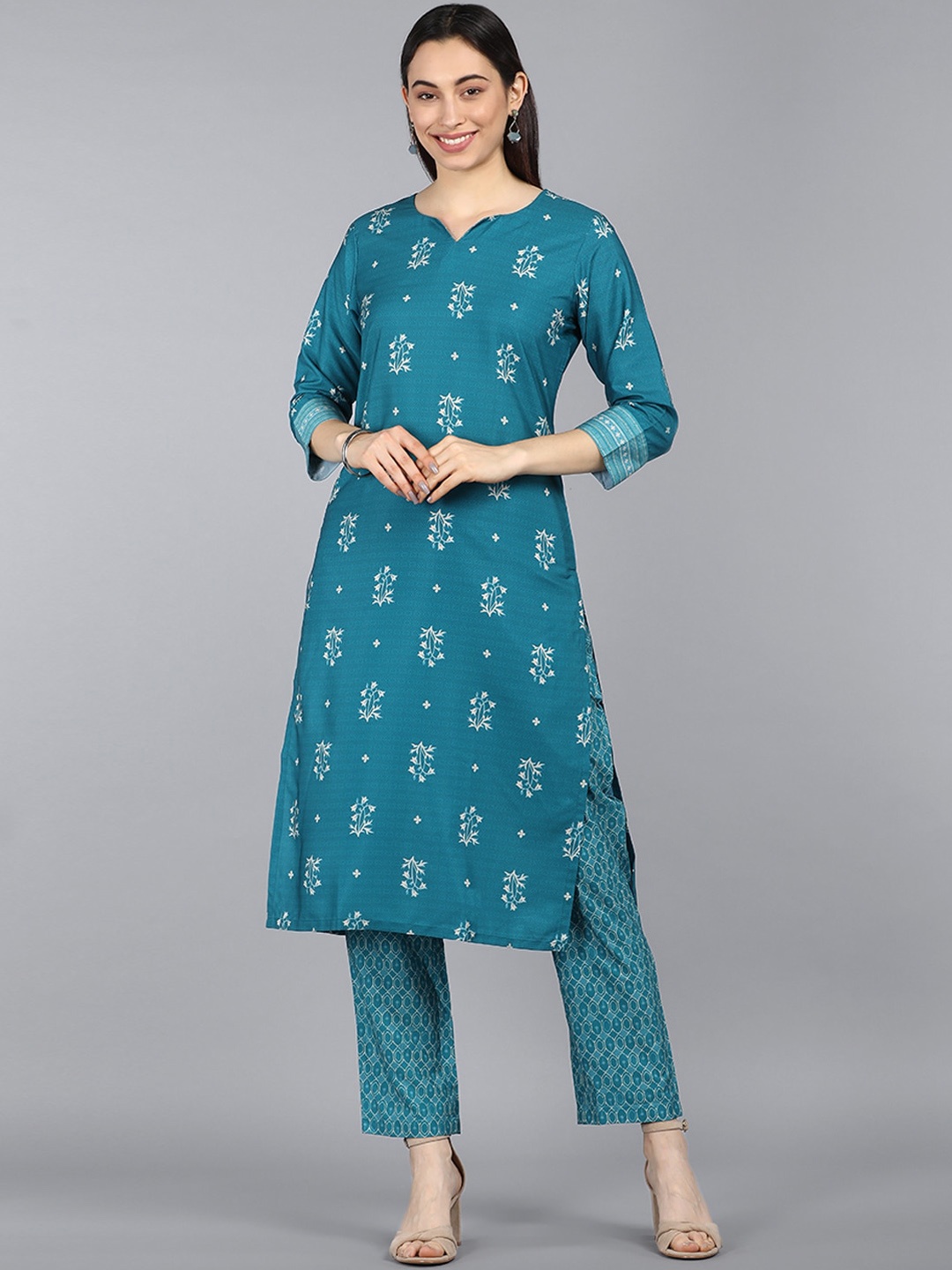 

AHIKA Women Teal Blue & White Floral Printed Kurta With Trousers