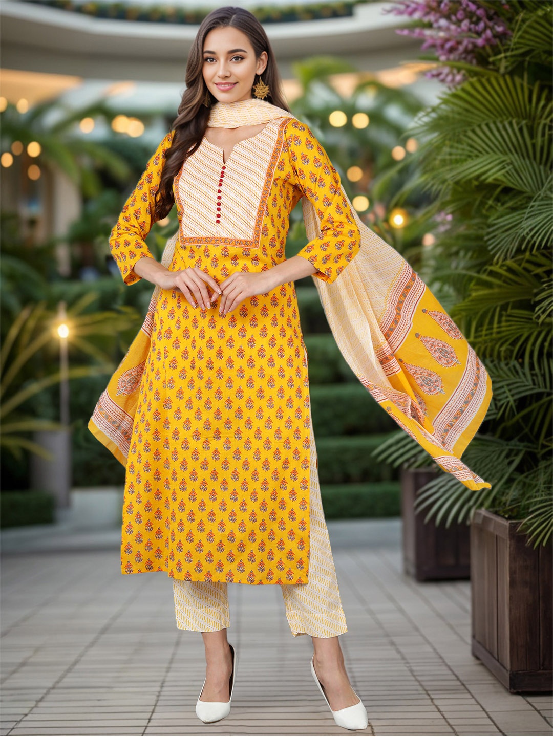 

AHIKA Women Yellow Ethnic Motifs Printed Kurta with Trousers