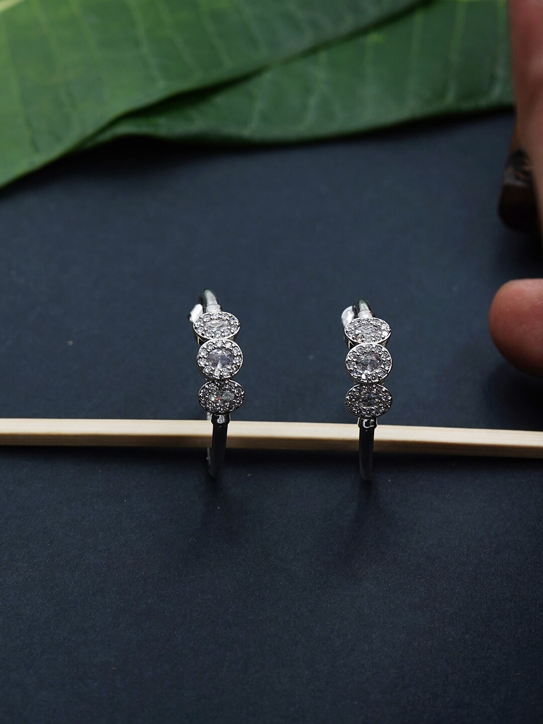 

Voylla White Silver-Plated CZ Embellished Contemporary Half Hoop Earrings