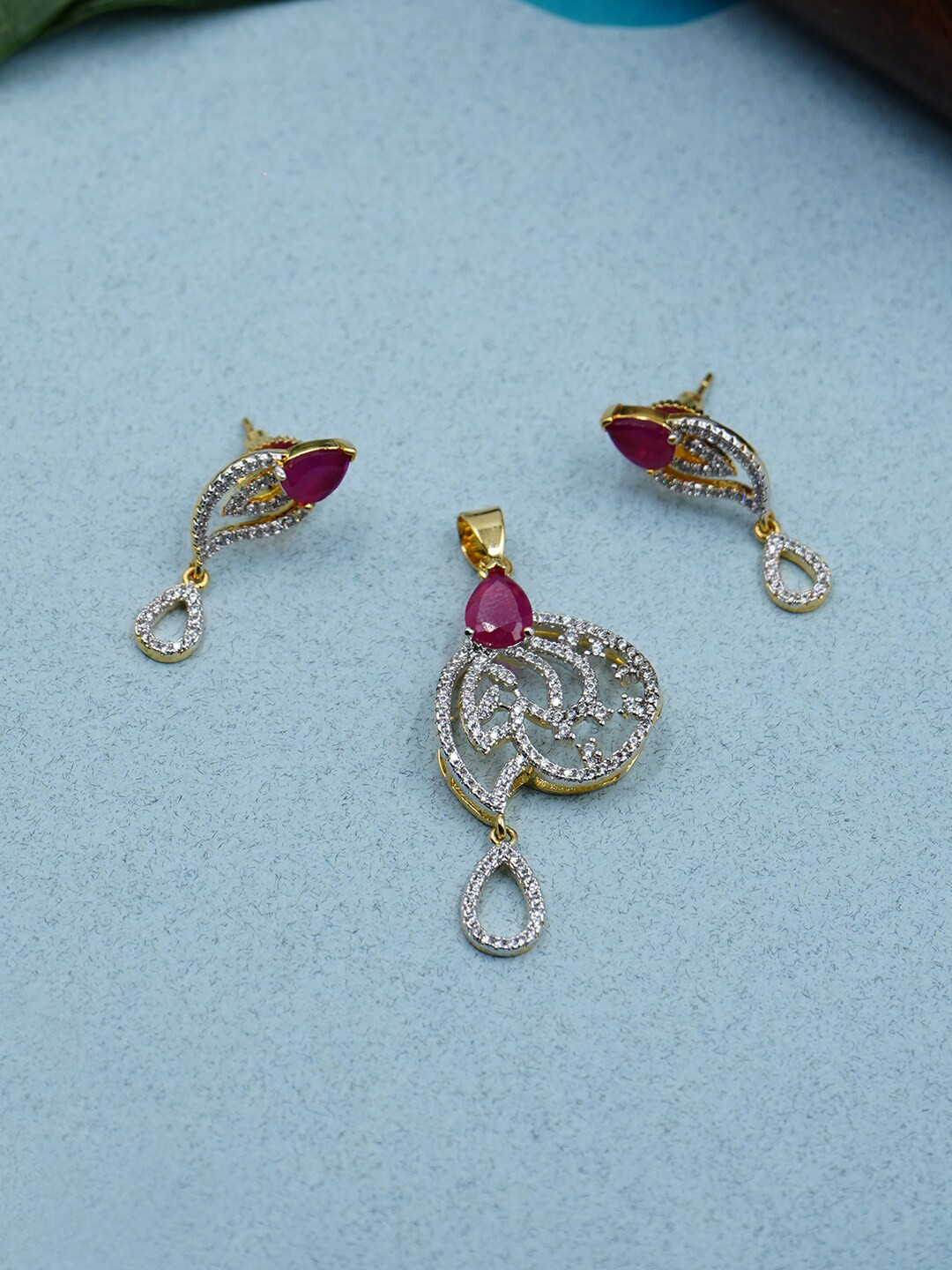 

Voylla Gold-Toned White & Pink Cubic Zirconia Studded Pendant Set