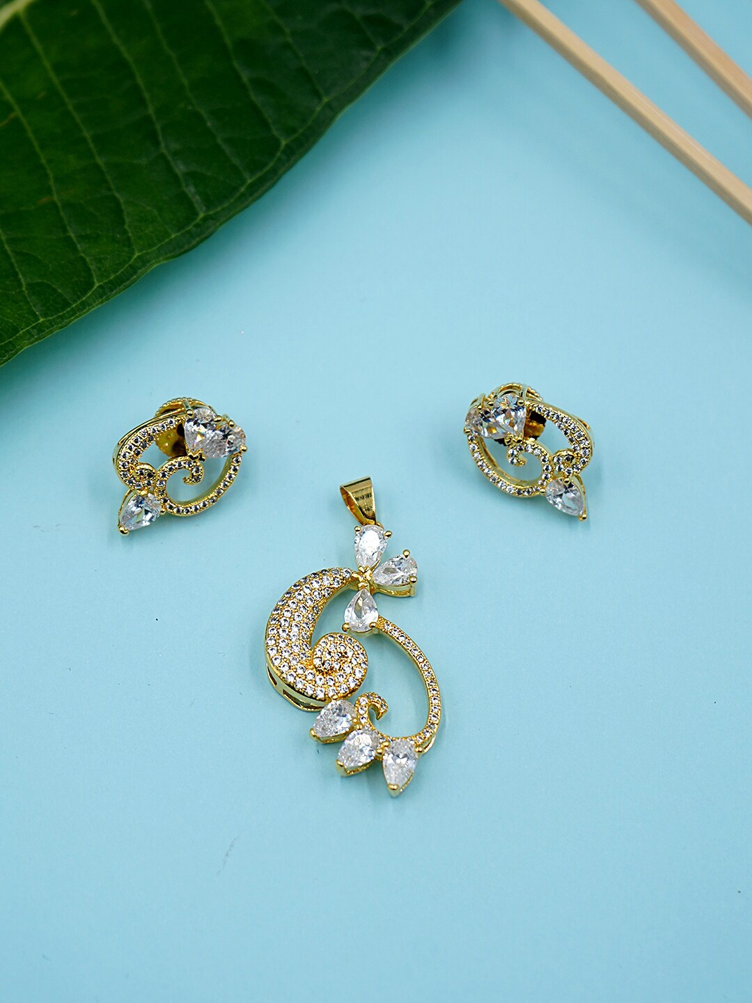 

Voylla Women Gold-Toned & Plated CZ Enamelled Pendant With Earrings