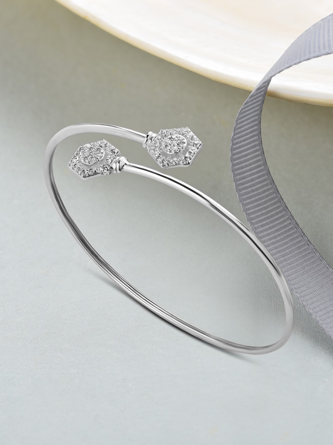 

AMI Women Silver-Toned Brass Cubic Zirconia Silver-Plated Bangle-Style Bracelet