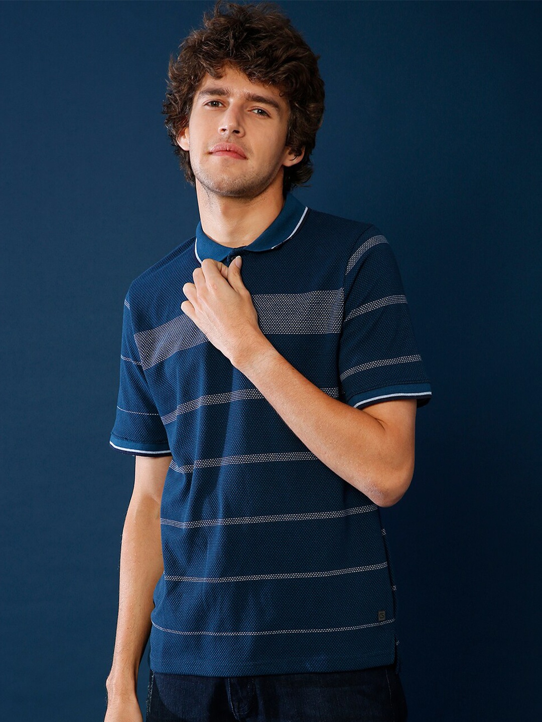 

Campus Sutra Men Teal Striped Polo Collar Pockets Outdoor T-shirt