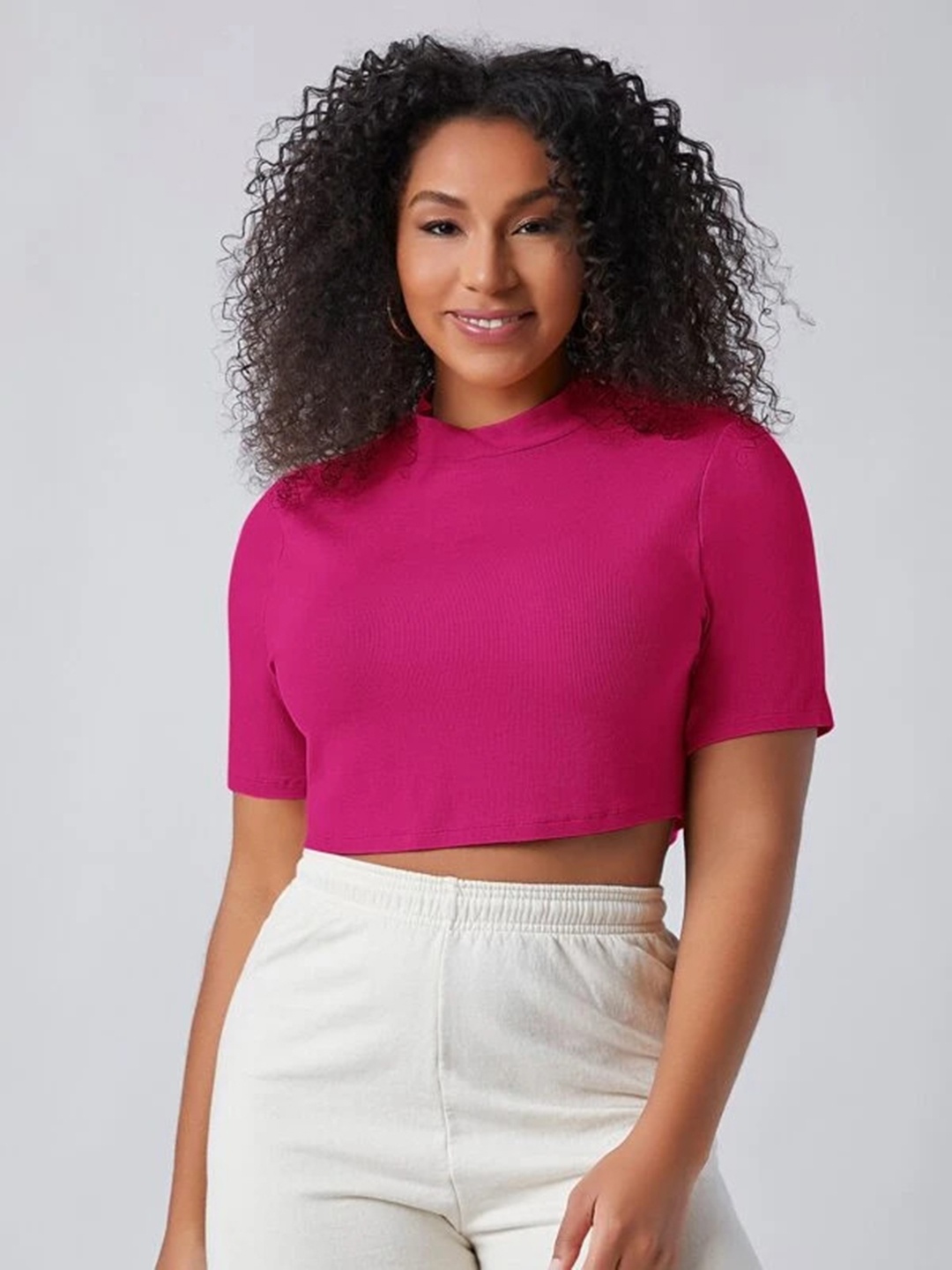 

Uptownie Lite Pink Stretchable High Neck Crop Top