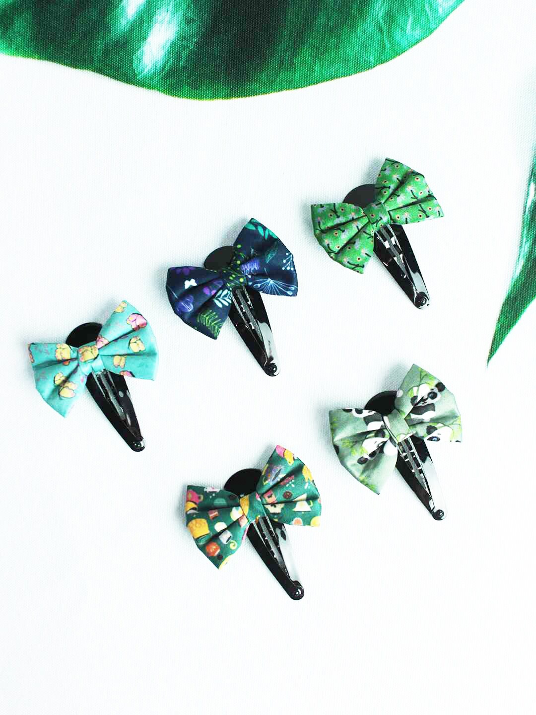 

Tossido Girls Green Set of 5 Tic Tac Hair Clip