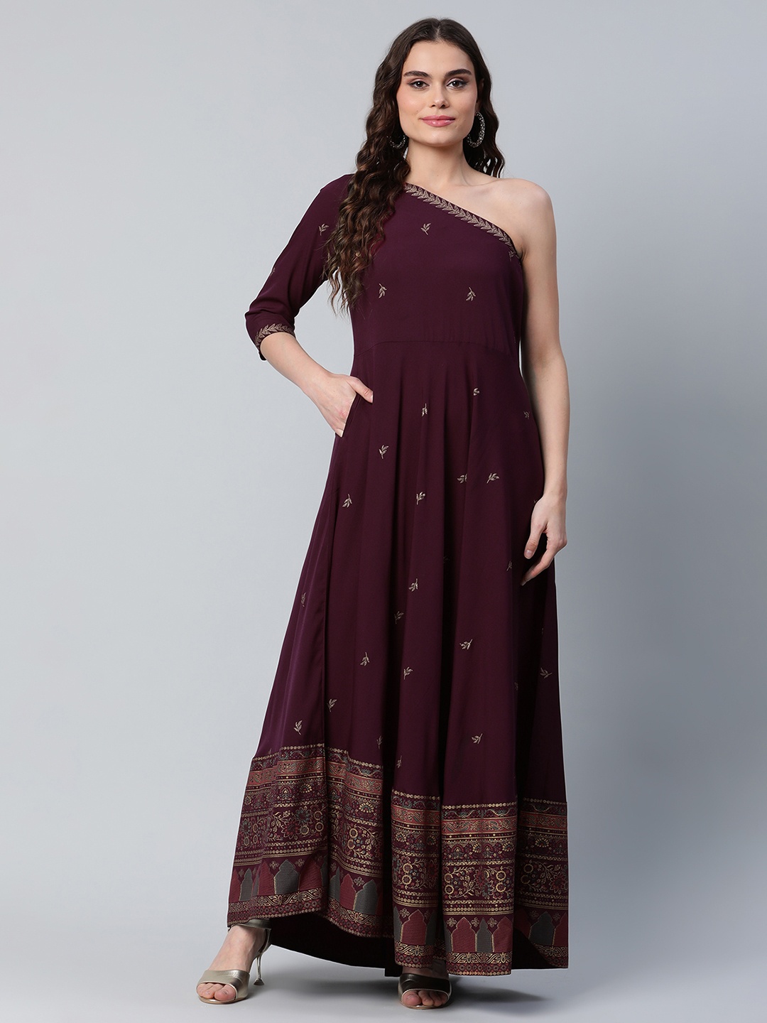 

Ahalyaa Women Burgundy & Gold-Toned Ethnic Motifs One Shoulder Ethnic Maxi Dress