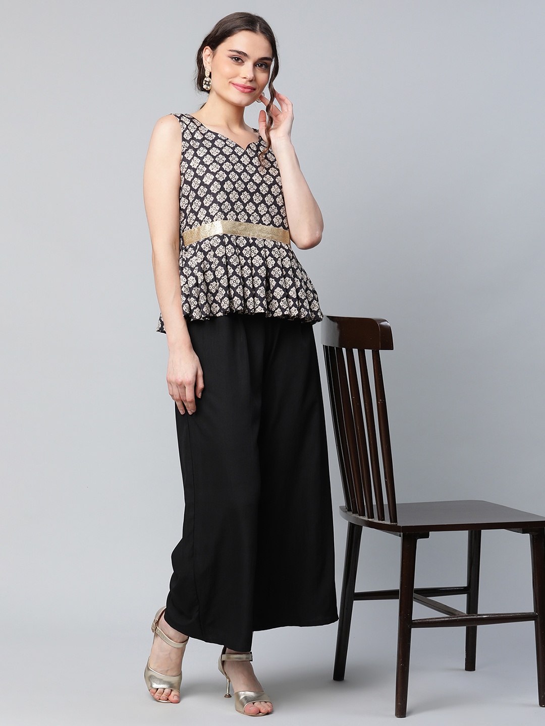 

Ahalyaa Women Black & Gold-Toned Ethnic Motifs Print Top with Palazzos