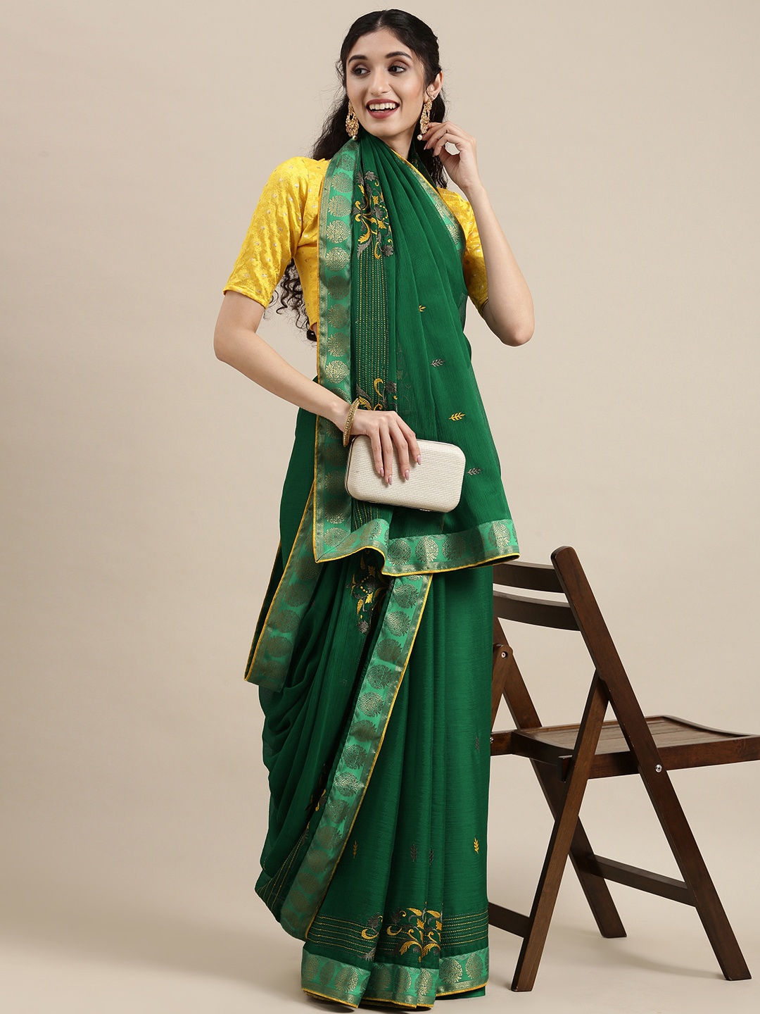 

Shaily Green Ethnic Motifs Embroidered Saree