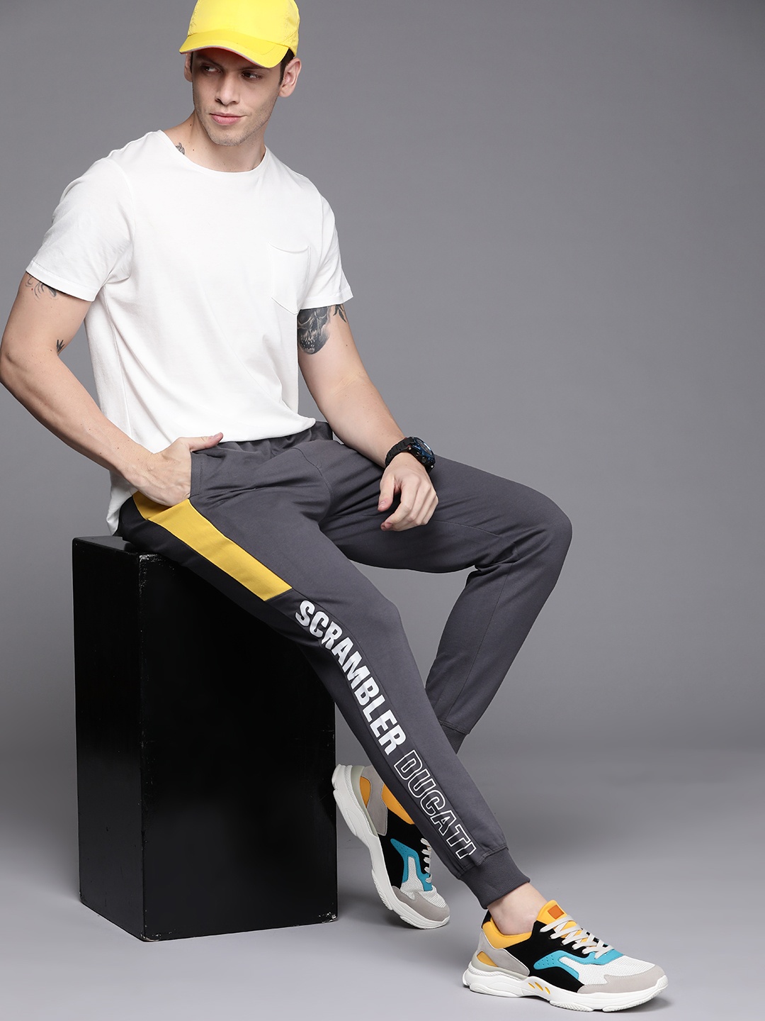 

Ducati Men Charcoal Grey & Yellow Typography Printed Joggers Track pants