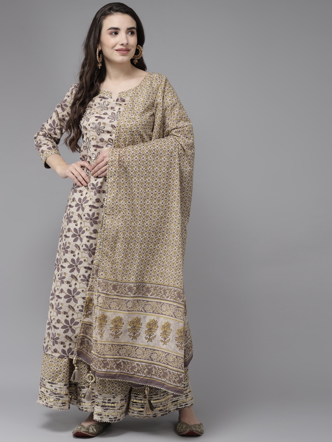 

Ishin Women Beige Floral Embroidered Beads and Stones Kurta with Sharara & With Dupatta