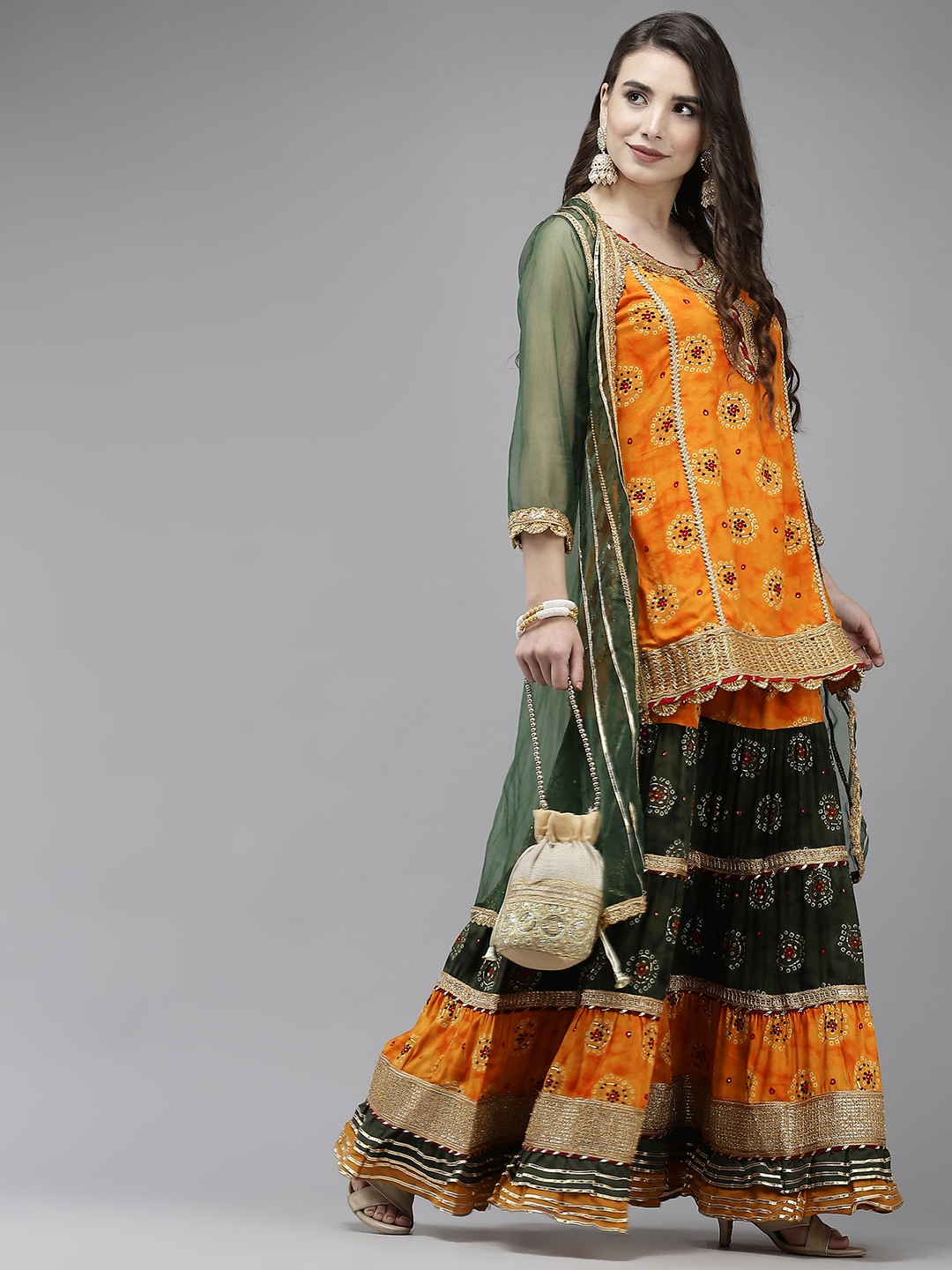 

Ishin Women Mustard Yellow Bandhani Printed Gotta Patti Kurta with Sharara & Jacket