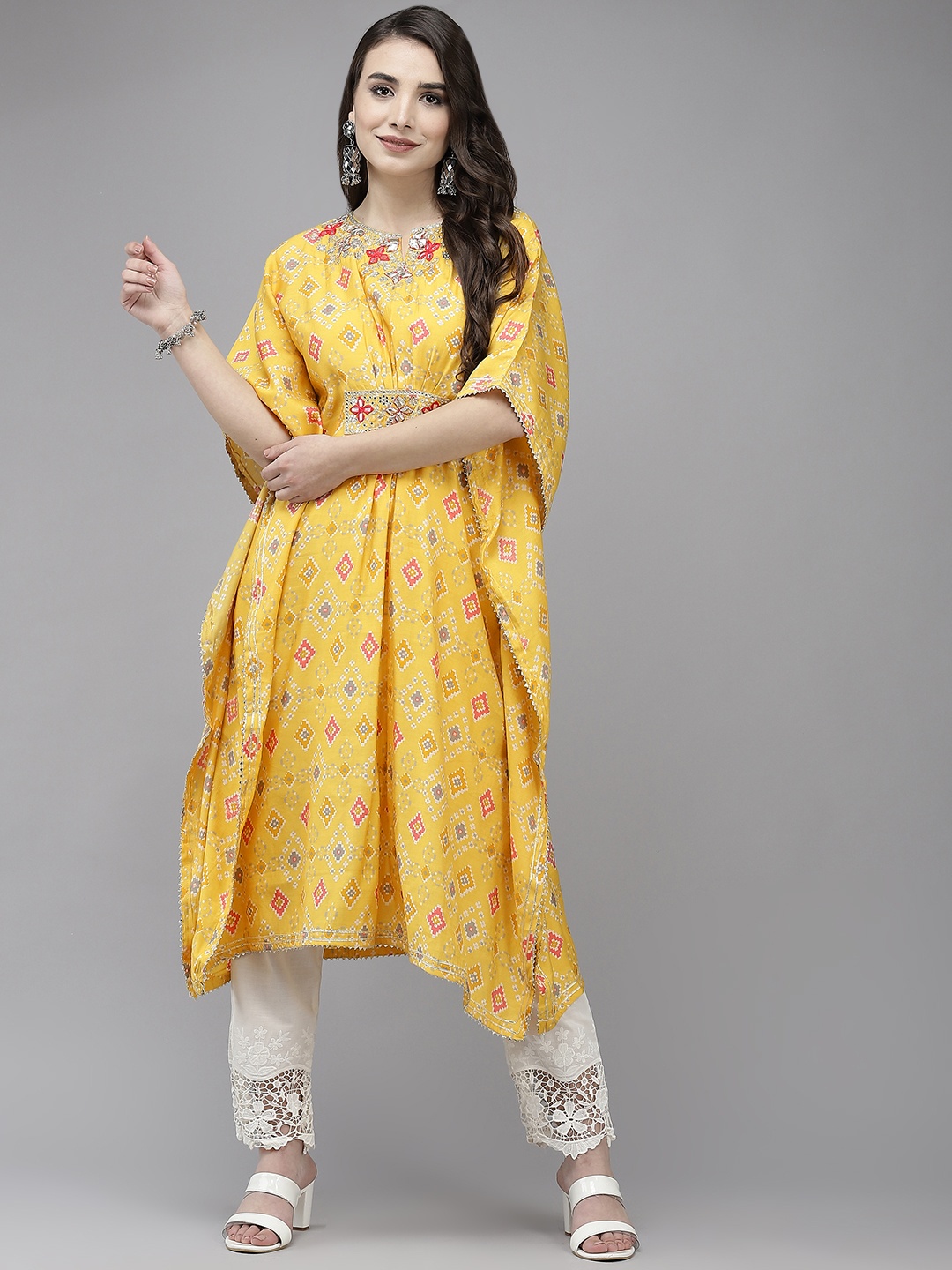 

Ishin Women Yellow Bandhani Printed Gotta Patti Kaftan Kurta with Trousers