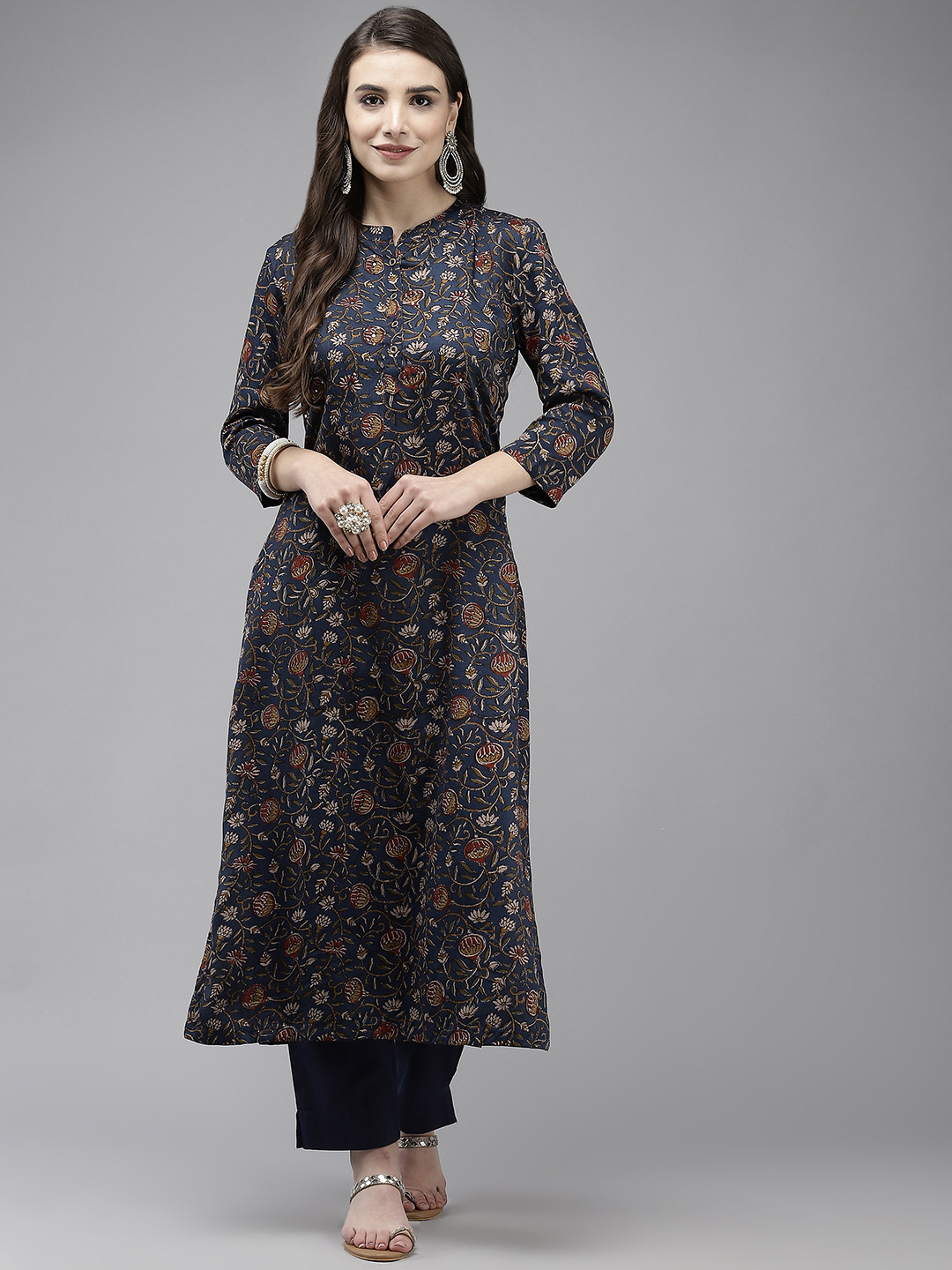 

Ishin Women Navy Blue Ethnic Motifs Printed Kurta with Trousers