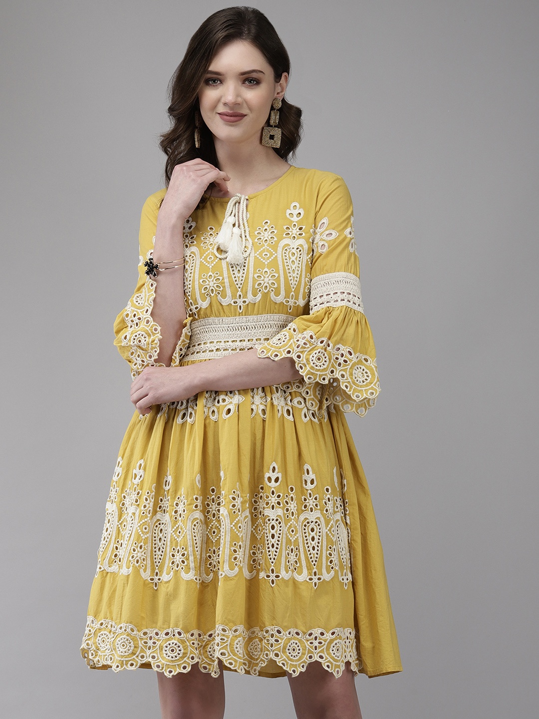 

Ishin Mustard Yellow Floral Embroidered Tie-Up Neck A-Line Dress