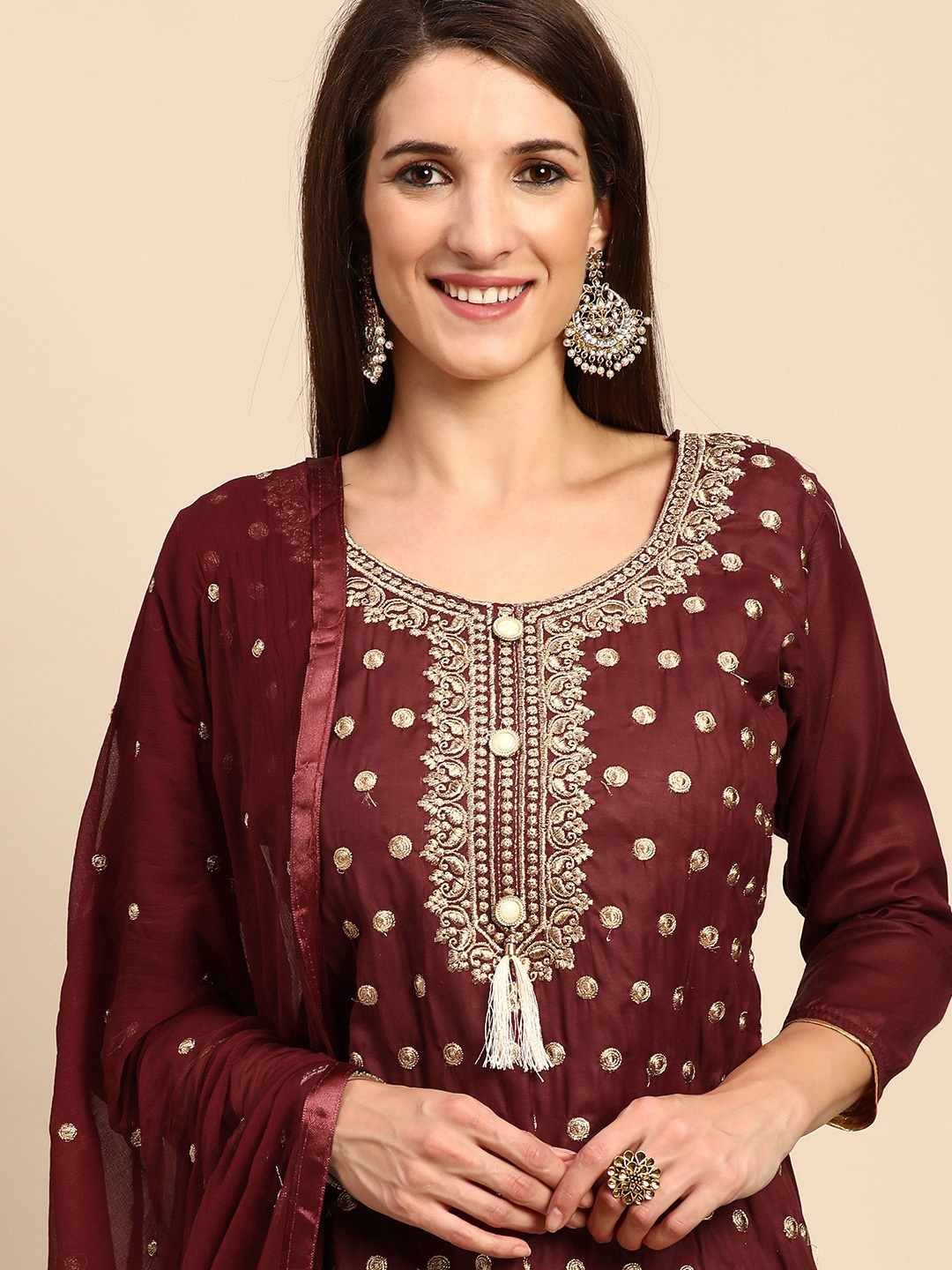 

Shaily Maroon & Golden Zari Embroidered Unstitched Dress Material
