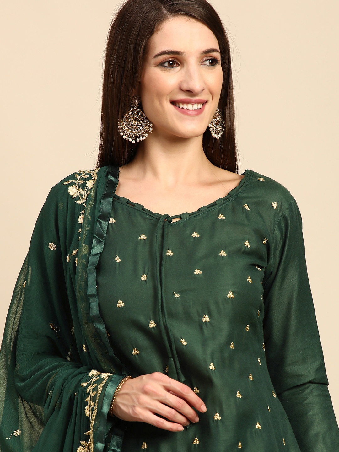 

Shaily Green & Golden Zari Embroidered Unstitched Dress Material