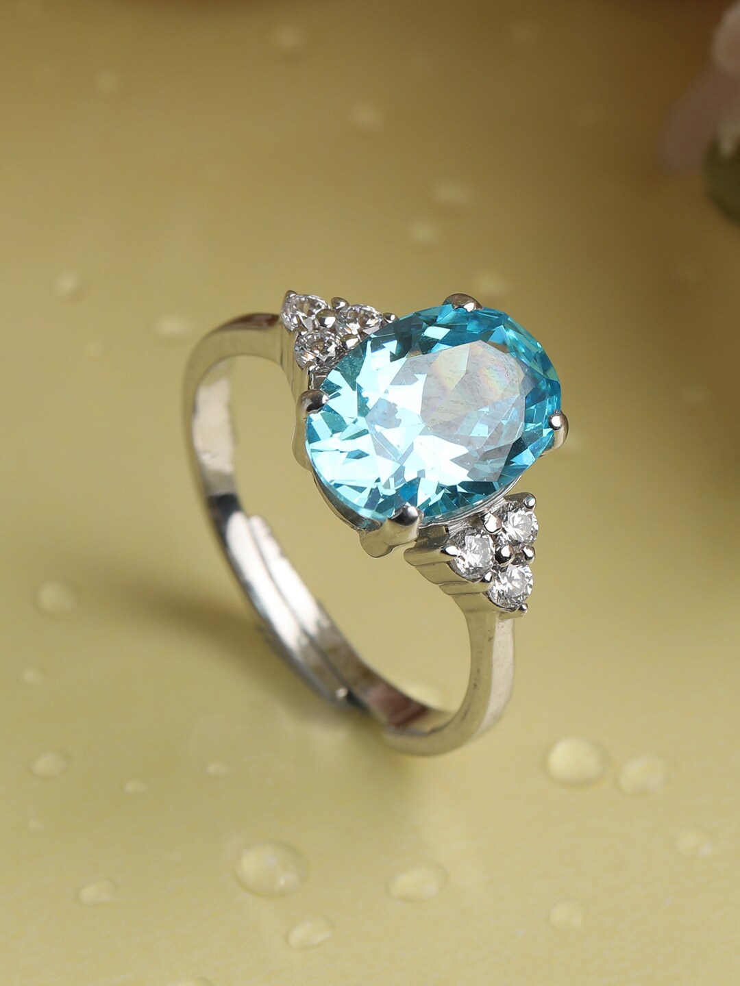 

Clara Silver-Toned & Turquoise Blue Cubic Zirconia Stone Studded Adjustable Finger Ring