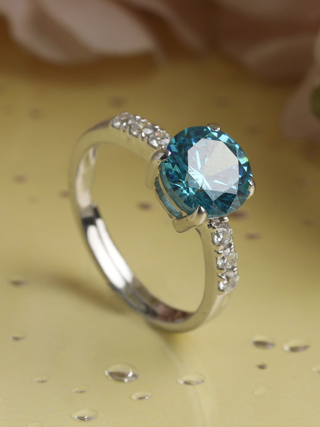 

Clara Blue & Silver-Toned Cubic Zirconia Studded Adjustable Finger Ring