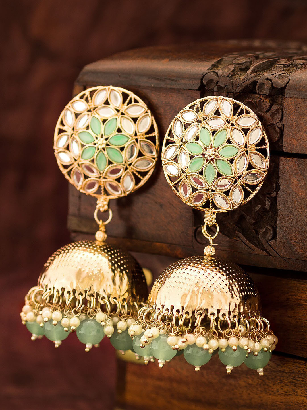 

aadita Gold-Toned Dome Shaped Jhumkas Earrings