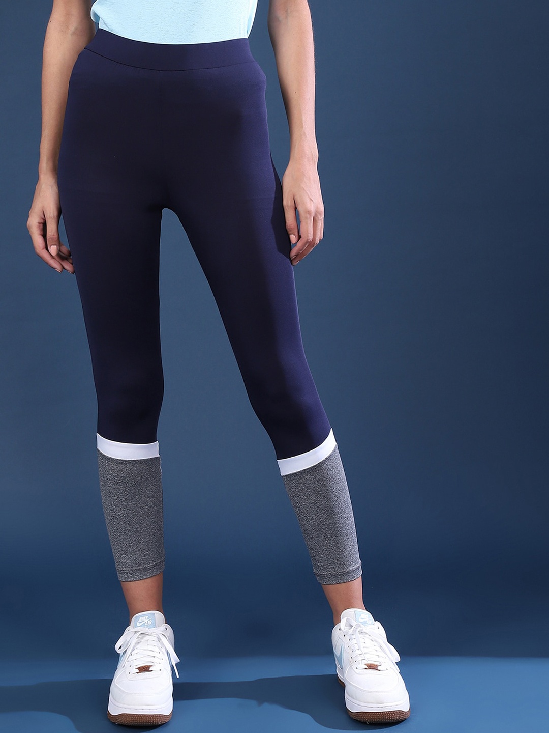 

Campus Sutra Women Navy Blue & Grey Colourblocked Anti-Odor Dry-Fit Tights