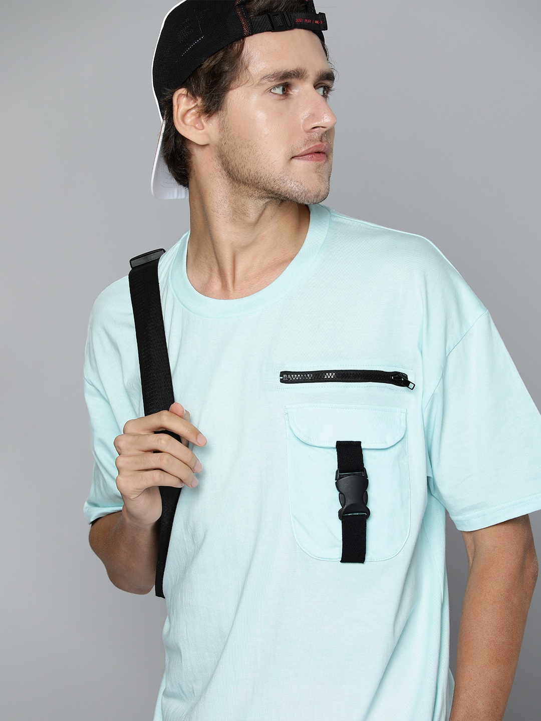 

Kook N Keech Men Light Blue Solid Pure Cotton Oversized T-shirt With Buckle-Detailed Pocket