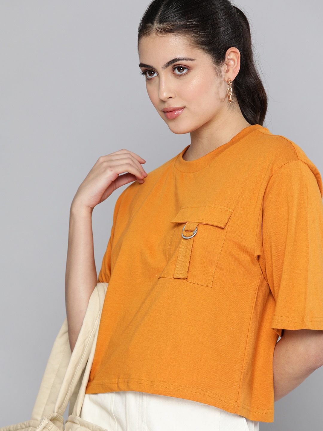 

Kook N Keech Women Yellow Solid Pocket Detailed Casual Top