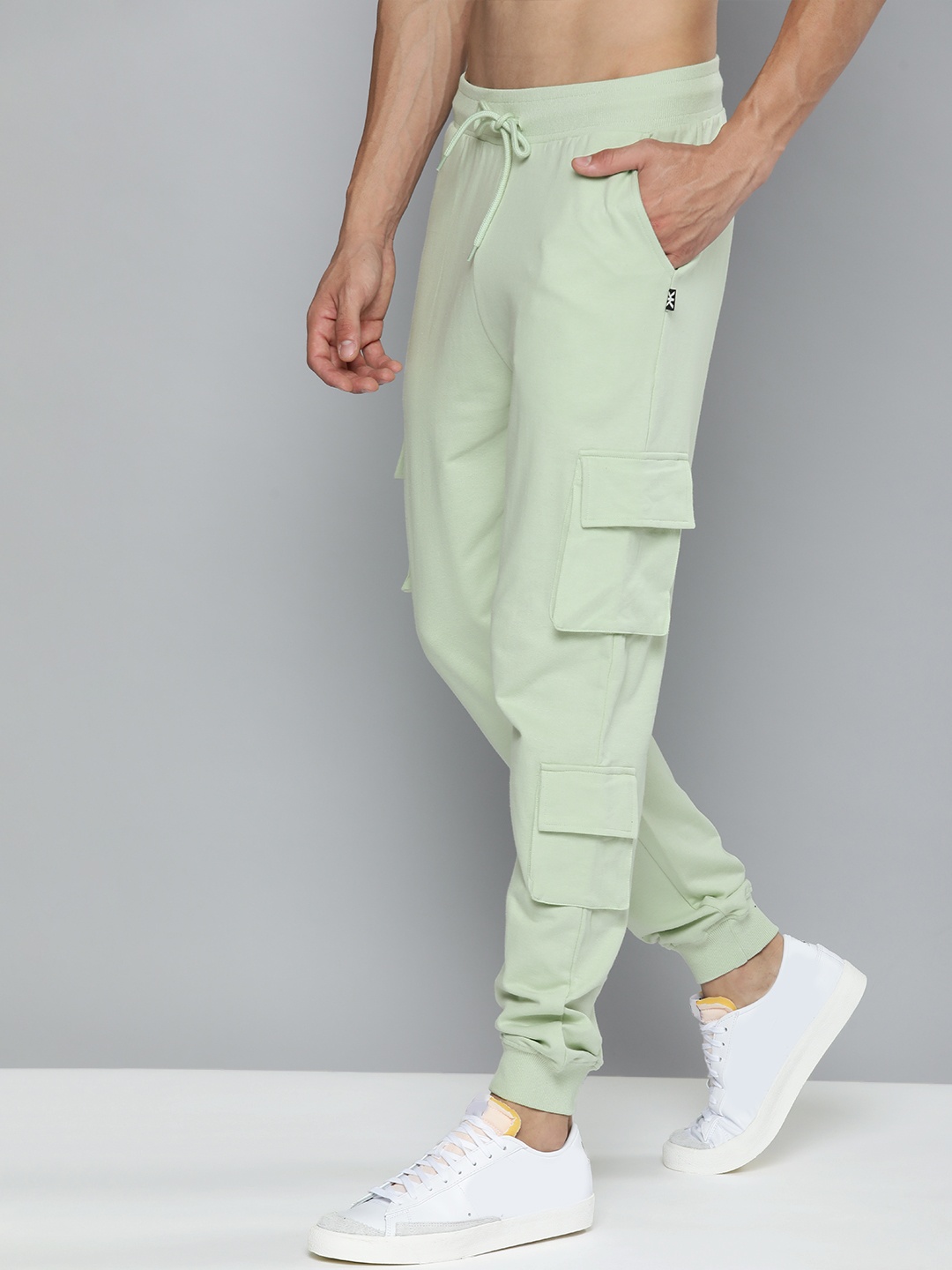 

Kook N Keech Men Summer Green Typography Printed Mid Rise Casual Joggers, Lime green