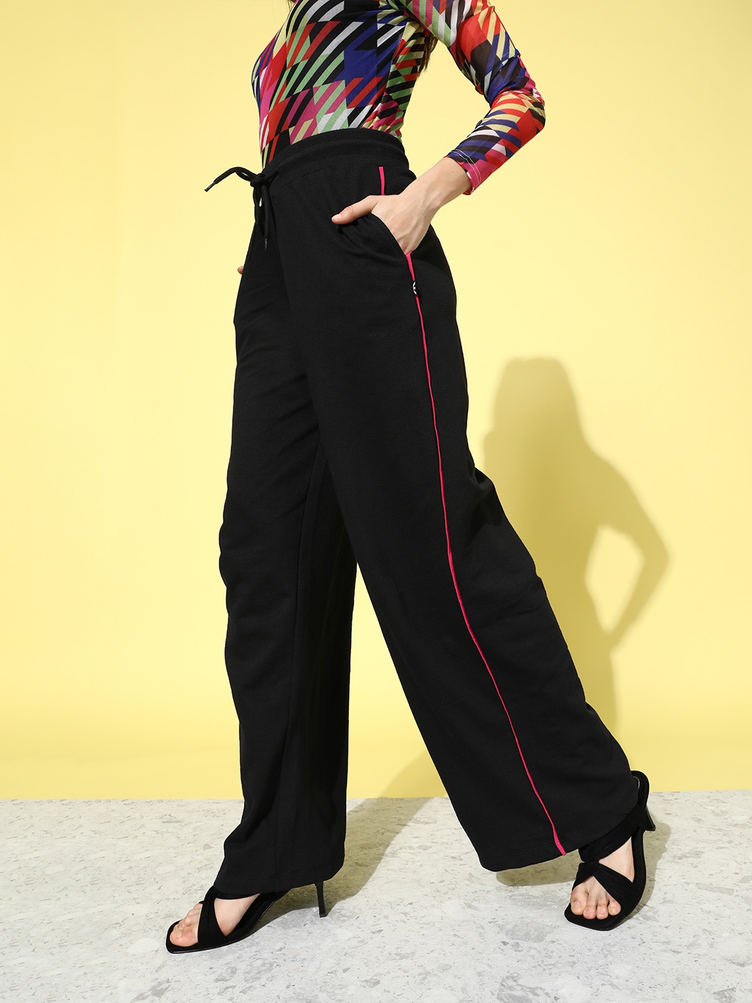 

Kook N Keech Women Stylish Black Solid Elevated Bottom Track Pants