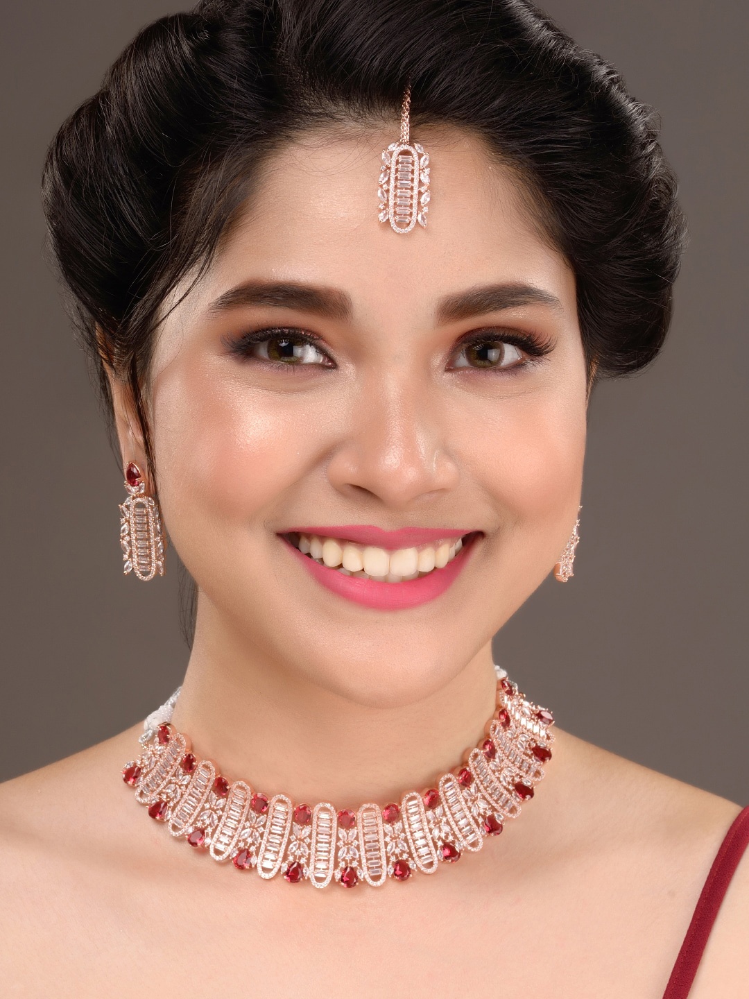 

Saraf RS Jewellery Rose Gold-Plated White & Red AD-Studded Jewellery Set