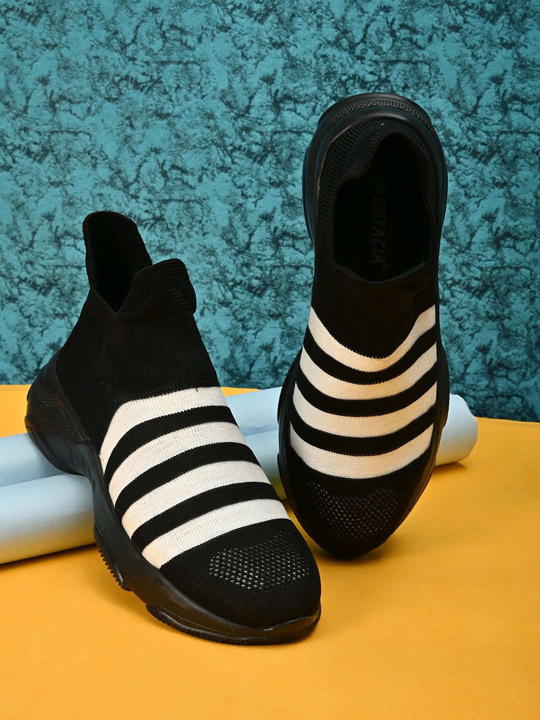 

Fentacia Men Black Woven Design Slip-On Sneakers
