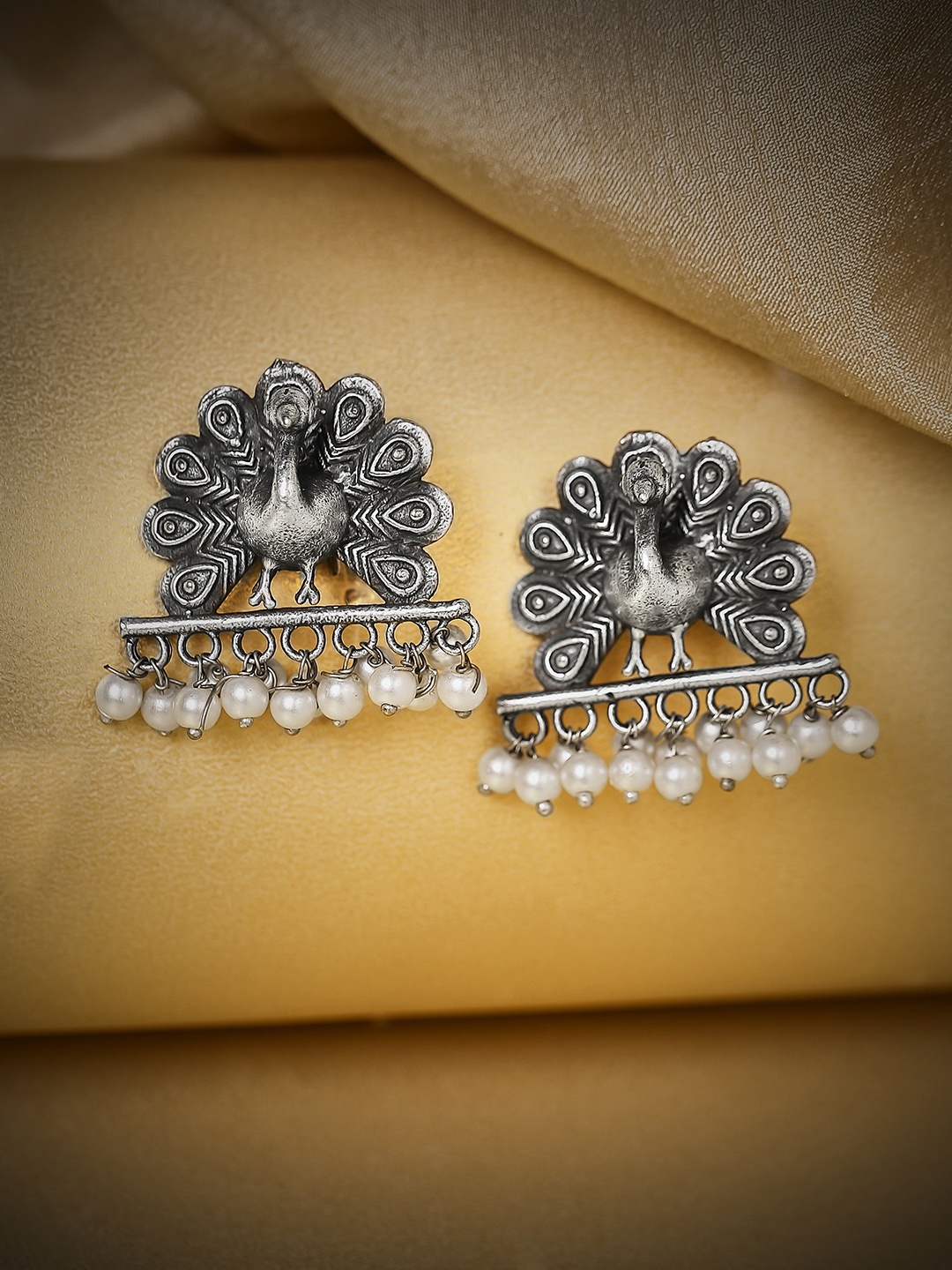 

Rubans Silver-Toned Peacock Shaped Studs Earrings