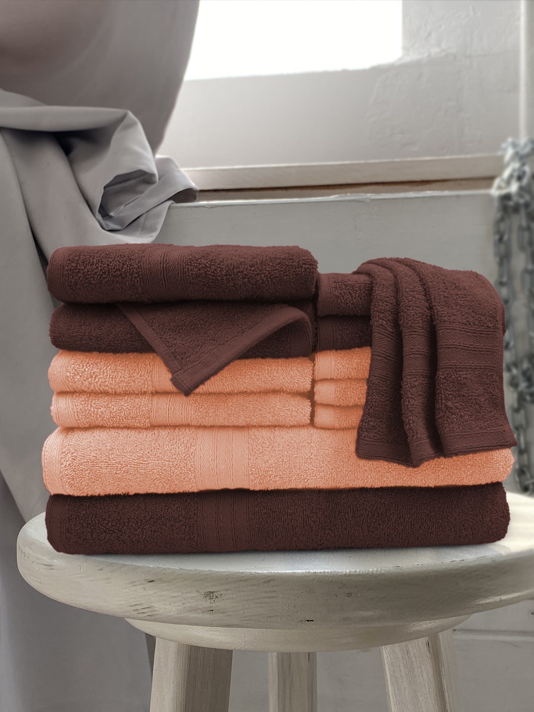 

Aura Pack of 12 Brown & Peach-Coloured Solid 500 GSM Cotton Towels