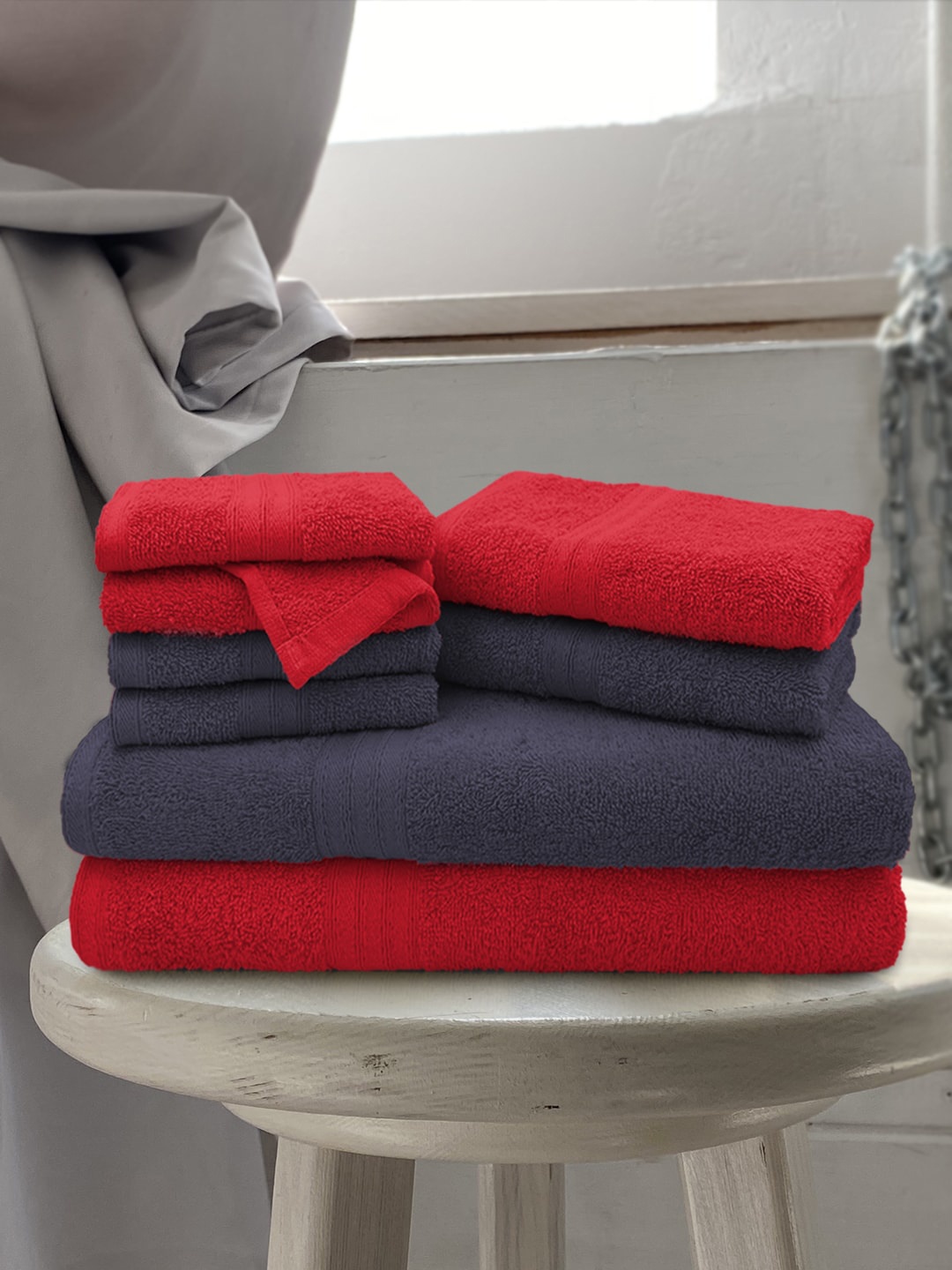 

Aura Set Of 8 Red & Navy Blue Solid Cotton Towel Set