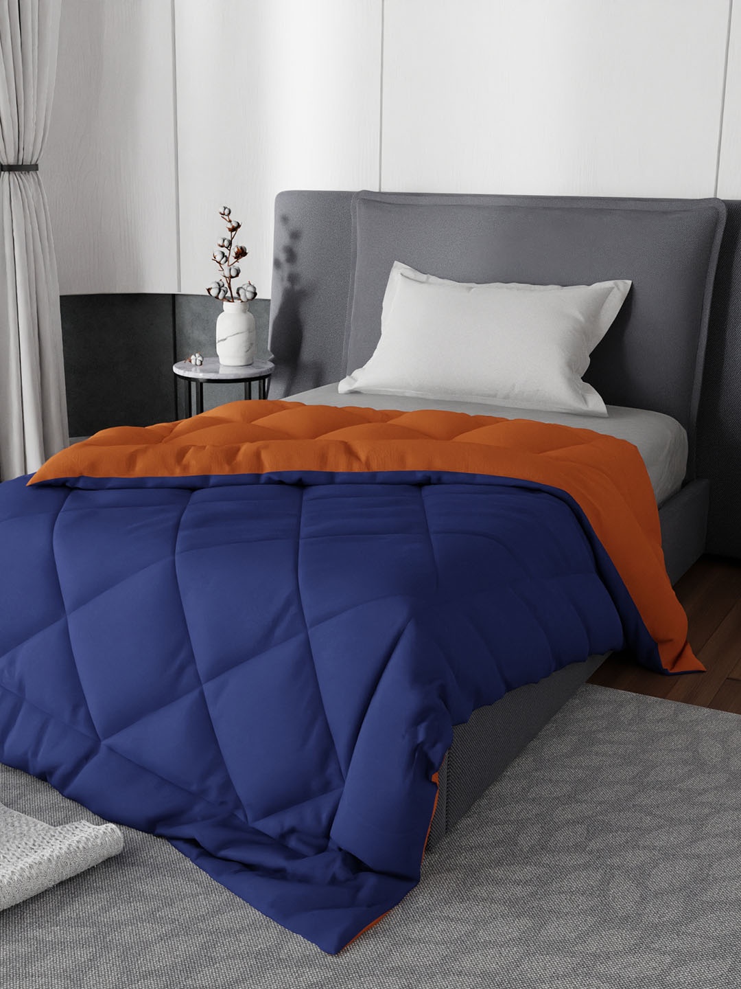 

Stoa Paris Blue & Orange Solid AC Room 200 GSM Single Bed Reversible Comforter