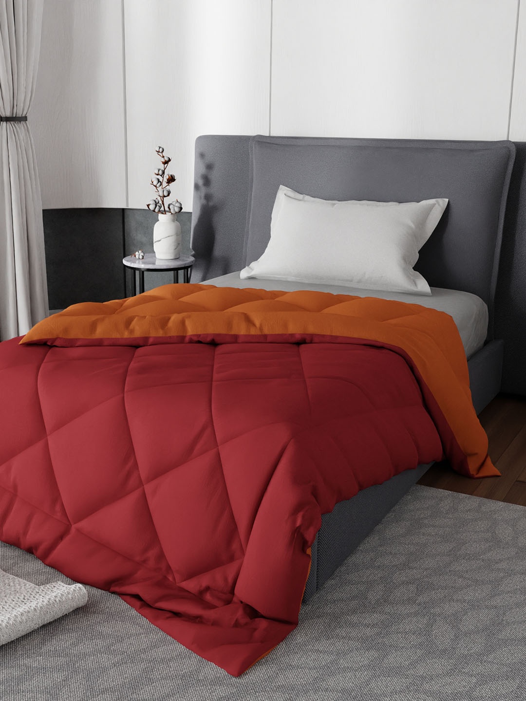 

Stoa Paris Maroon & Orange Solid AC Room 200 GSM Reversible Single Bed Comforter